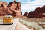 Amex Travel road trip through desert landscapes with a vintage yellow van