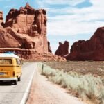 Amex Travel road trip through desert landscapes with a vintage yellow van